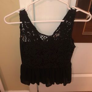 Boutique black peplum tank top with lace detail
